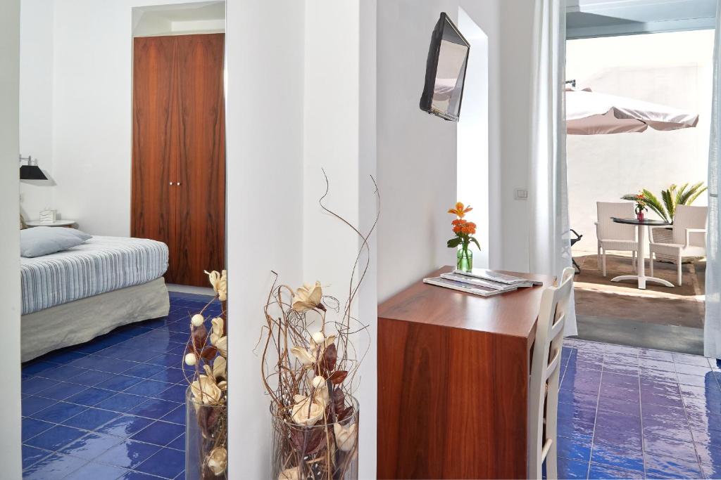Postel nebo postele na pokoji v ubytování Hotel Victoria Place