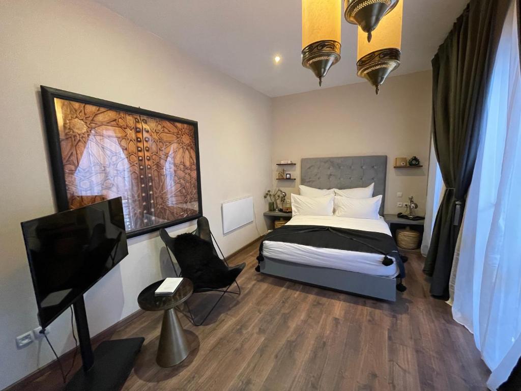 Postel nebo postele na pokoji v ubytování YVES Marrakech