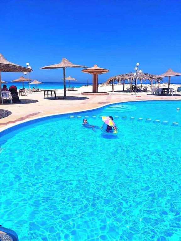 Bazén v ubytování Duplex Luxury 3 Rooms Villa El Karma Sidi Abdelrahman Families ONLY nebo v jeho okolí