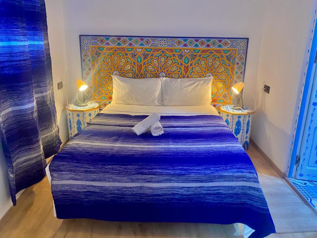 Postel nebo postele na pokoji v ubytování Hotel Miramonte