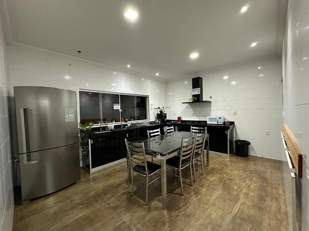 Kuchyň nebo kuchyňský kout v ubytování Hostel Amarelinho