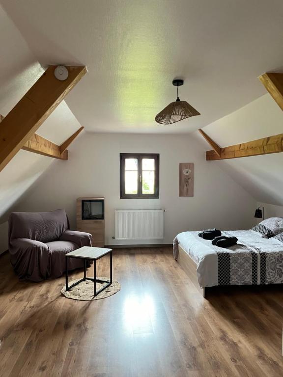 Postel nebo postele na pokoji v ubytování Ancienne ferme de Charles