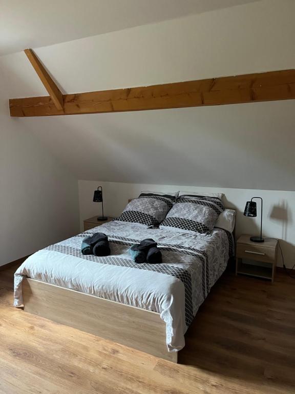 Postel nebo postele na pokoji v ubytování Ancienne ferme de Charles