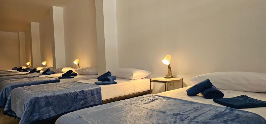 En eller flere senge i et værelse på Estudio Andrea Las Palmas