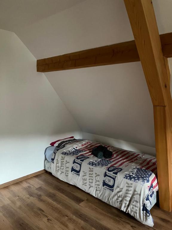 Postel nebo postele na pokoji v ubytování Ancienne ferme de Charles