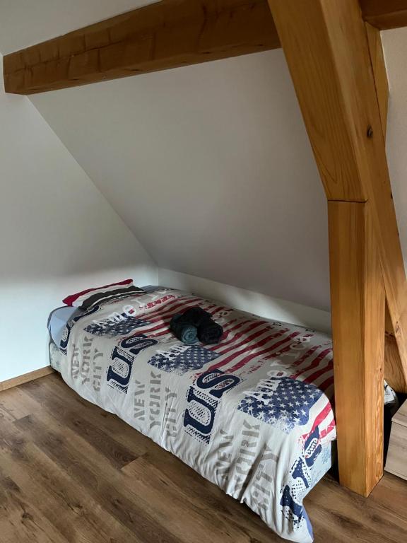 Postel nebo postele na pokoji v ubytování Ancienne ferme de Charles
