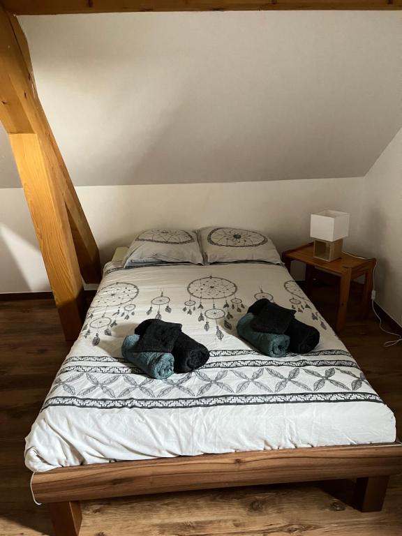 Postel nebo postele na pokoji v ubytování Ancienne ferme de Charles