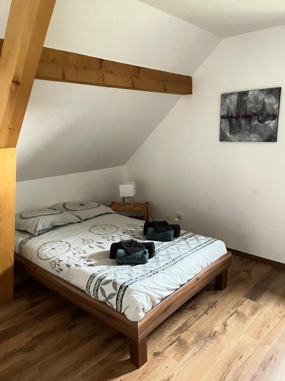 Postel nebo postele na pokoji v ubytování Ancienne ferme de Charles