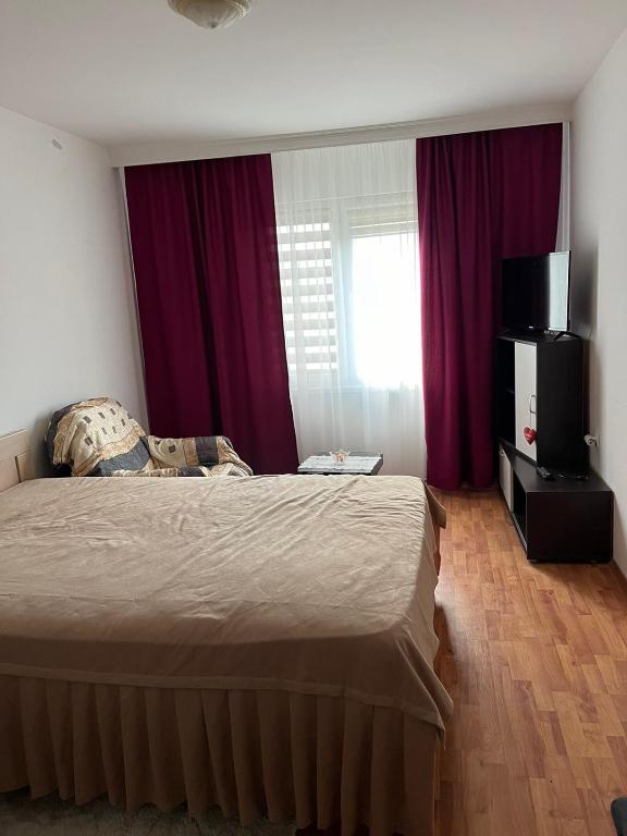 Postel nebo postele na pokoji v ubytování Vila Divna
