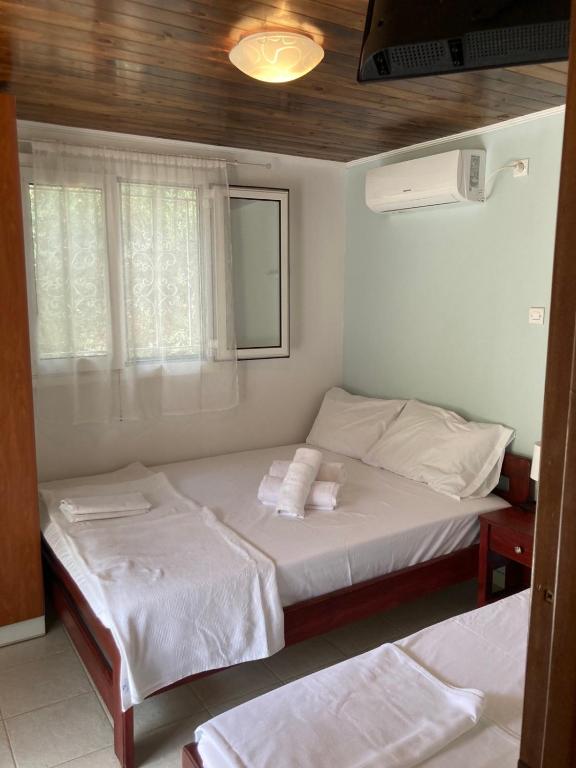 Postel nebo postele na pokoji v ubytování Helios Beach House
