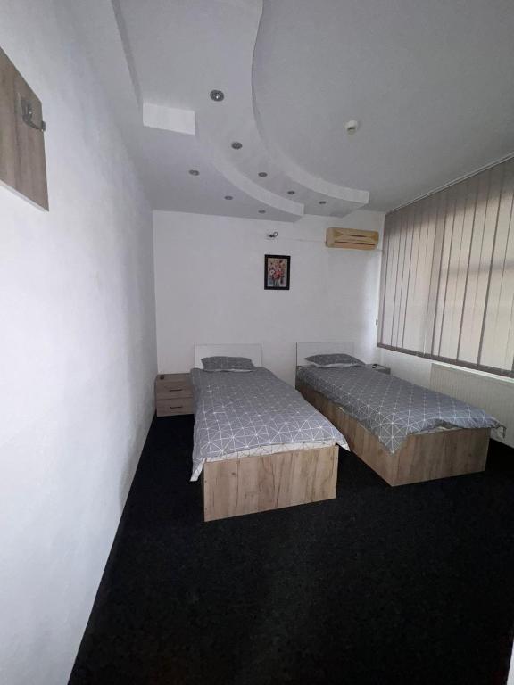 Postel nebo postele na pokoji v ubytování Sico Hostel Centru