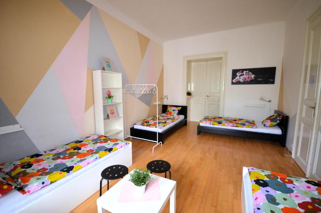Postel nebo postele na pokoji v ubytování Travel&Joy backpackers