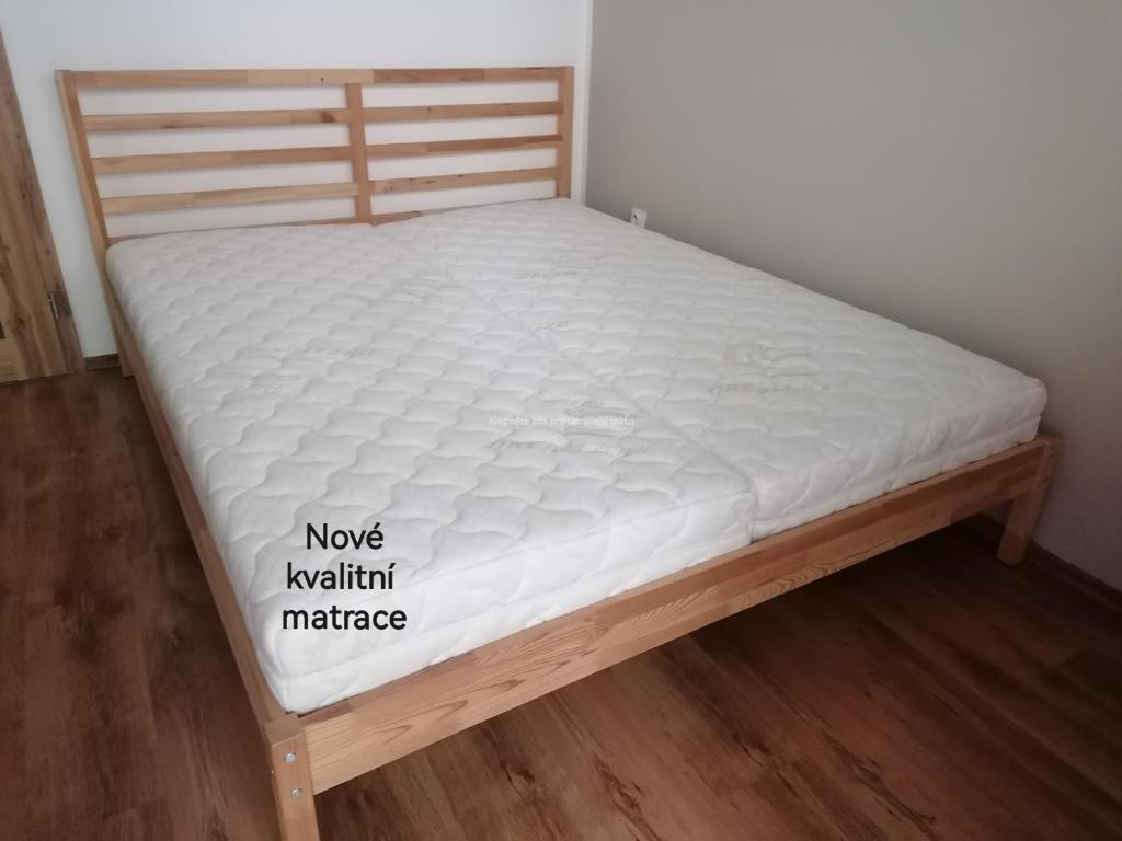 Postel nebo postele na pokoji v ubytování Apartmán Na Svahu, Krkonoše
