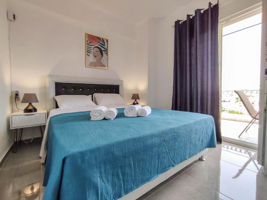 Postel nebo postele na pokoji v ubytování Aegean View Apartment