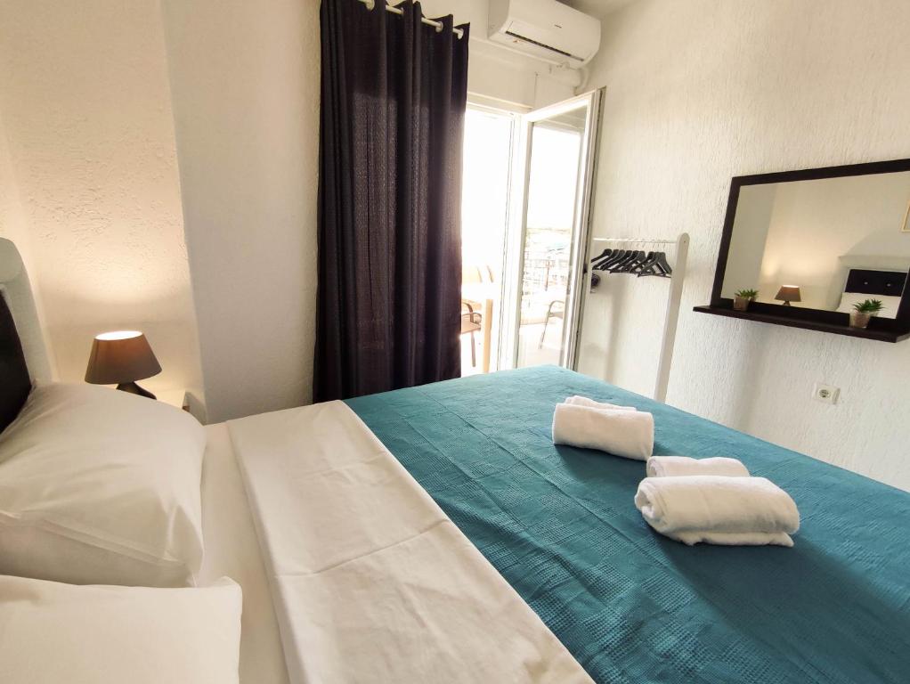 Postel nebo postele na pokoji v ubytování Aegean View Apartment