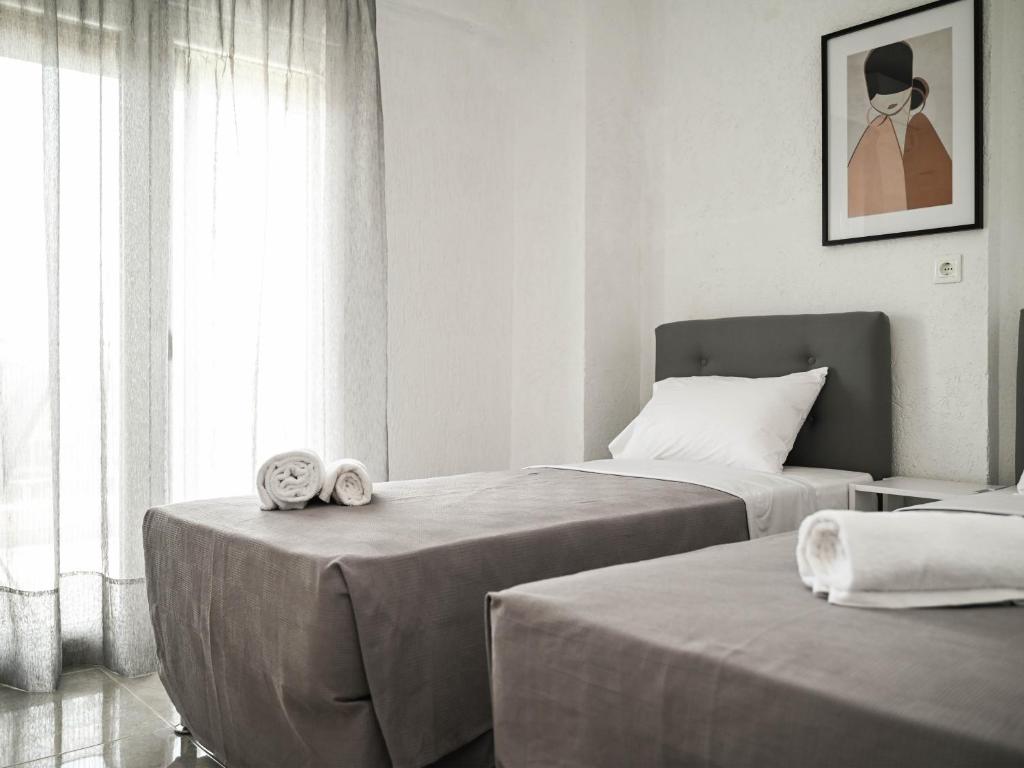 Postel nebo postele na pokoji v ubytování Aegean View Apartment