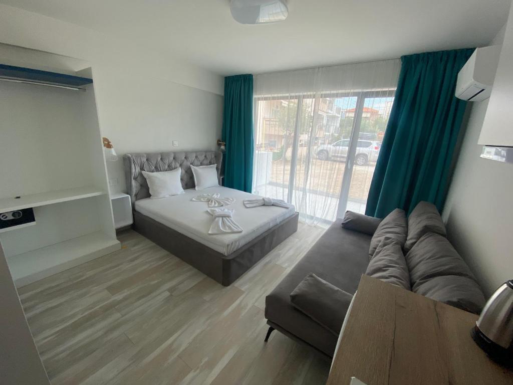 Postel nebo postele na pokoji v ubytování Sunny Beach Potos
