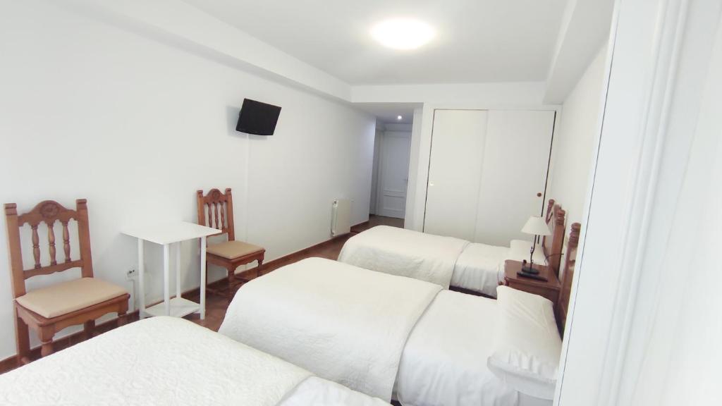 Postel nebo postele na pokoji v ubytování Pension Villa **