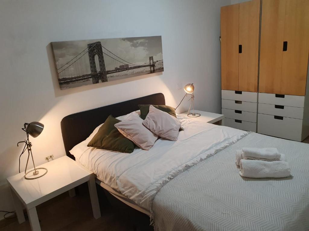 Postel nebo postele na pokoji v ubytování Calle las armas 105