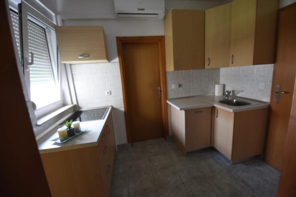 Kuchyň nebo kuchyňský kout v ubytování apartmani Puzek