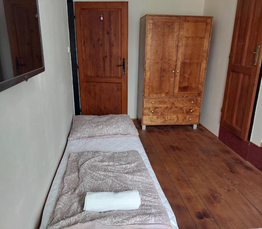 Postel nebo postele na pokoji v ubytování Penzion Harmonie