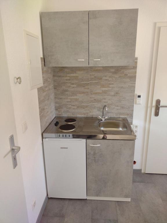 Kuchyň nebo kuchyňský kout v ubytování apartment-bb