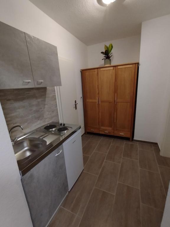 Kuchyň nebo kuchyňský kout v ubytování apartment-bb