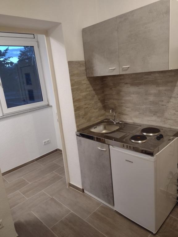 Kuchyň nebo kuchyňský kout v ubytování apartment-bb