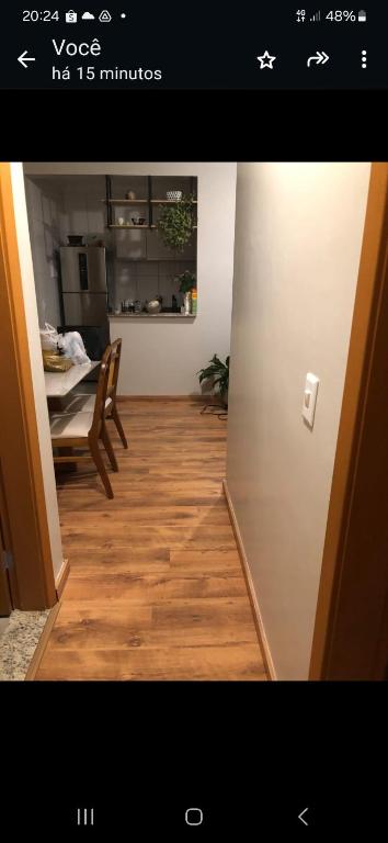 TV a/nebo společenská místnost v ubytování Apartamento compartilhado quarto com suite