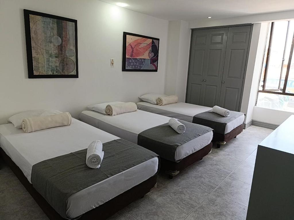 Letto o letti in una camera di Hotel Armenia Lions