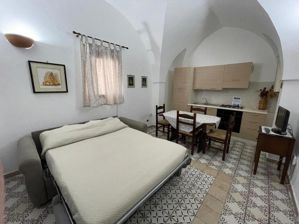 Postel nebo postele na pokoji v ubytování Masseria Triglie