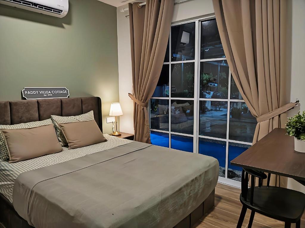 Postel nebo postele na pokoji v ubytování Paddy Villea Inn SPT Penang