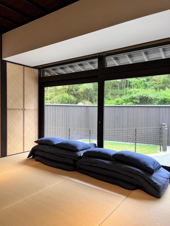 Foto sihtkohas Ukiha asuva majutusasutuse 小塩の灯り 石垣の別荘 galeriist