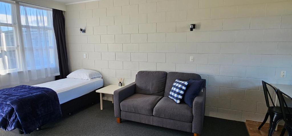 Postel nebo postele na pokoji v ubytování Endeavour Lodge Motel