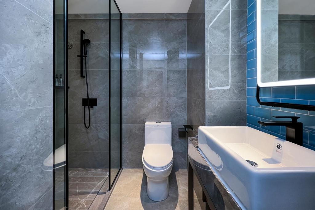 Koupelna v ubytování Echarm Hotel Guangzhou Dongpu Financial City Pazhou Convention Center - Free shuttle bus for Canton Fair