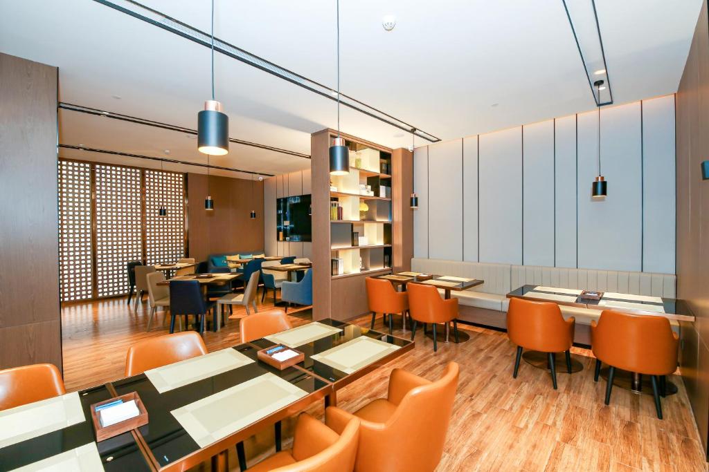 Posezení v ubytování Echarm Hotel Guangzhou Dongpu Financial City Pazhou Convention Center - Free shuttle bus for Canton Fair