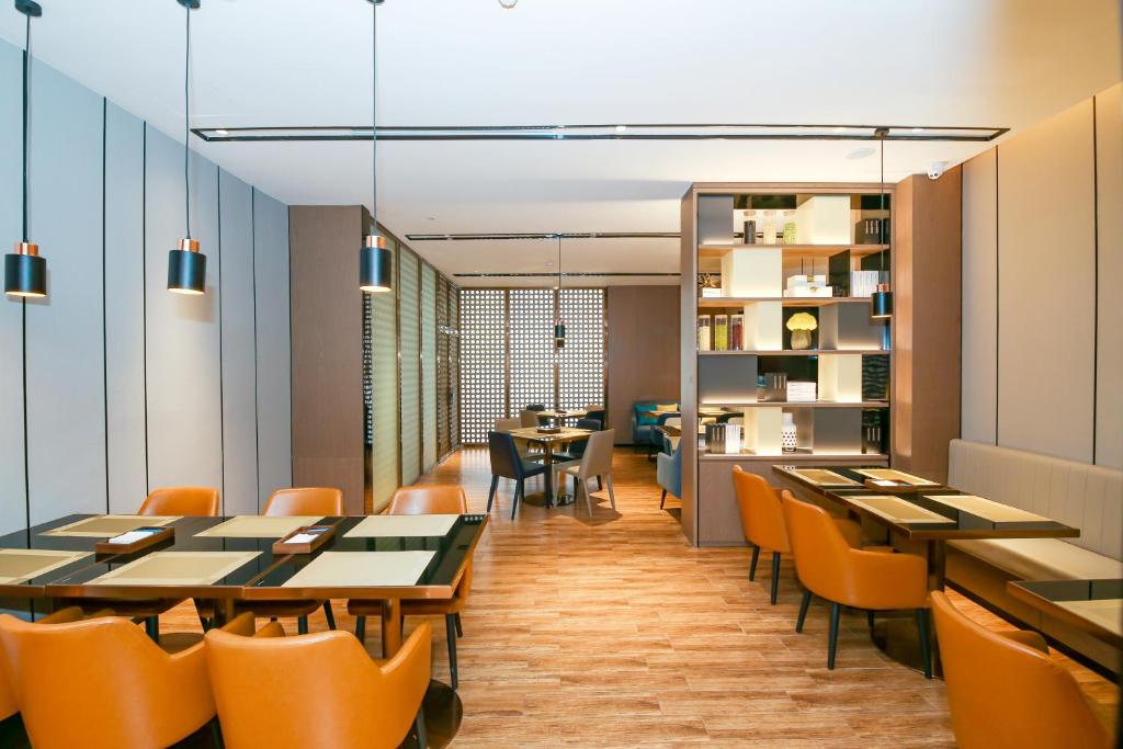 Posezení v ubytování Echarm Hotel Guangzhou Dongpu Financial City Pazhou Convention Center - Free shuttle bus for Canton Fair
