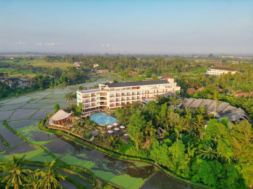 an aerial view of a resort with a pool at Royal Casa Ganesha in Ubud
