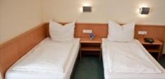 Postel nebo postele na pokoji v ubytování Hotel am Drömling
