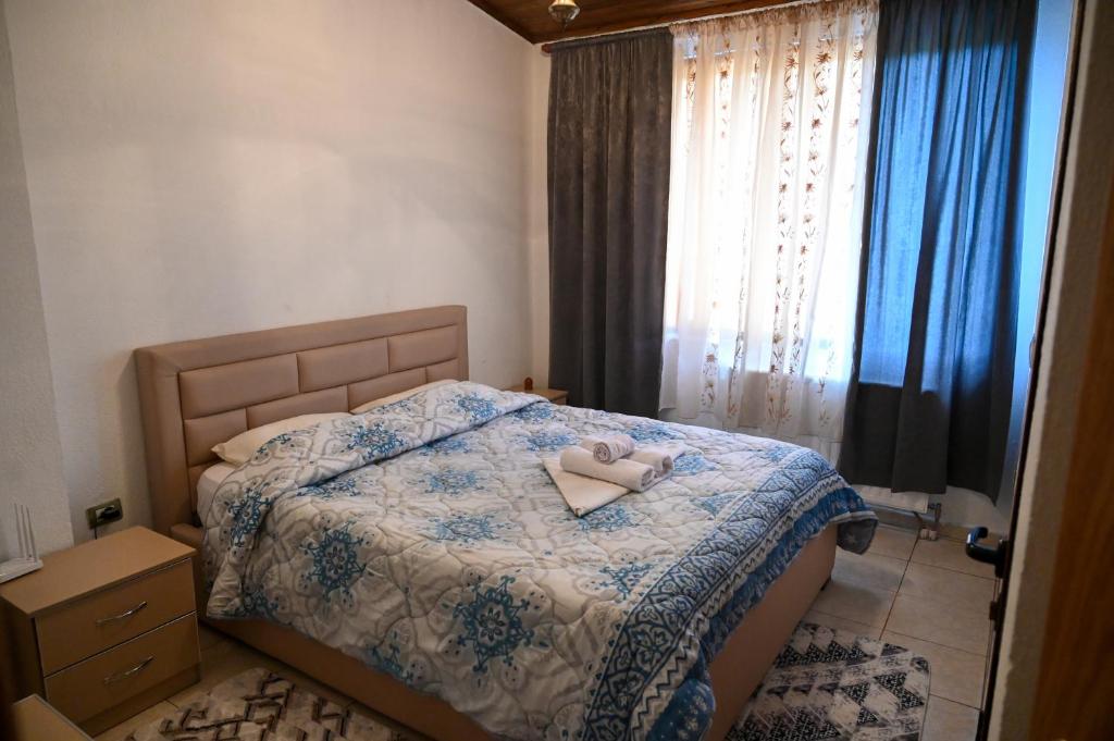 Postel nebo postele na pokoji v ubytování Joni Restaurant