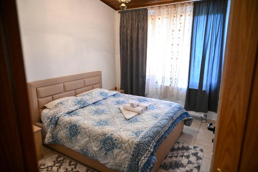 Postel nebo postele na pokoji v ubytování Joni Restaurant