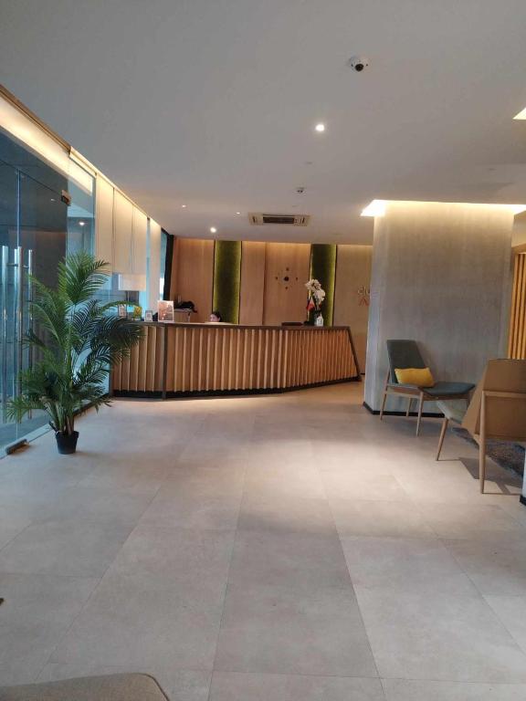 Posezení v ubytování AeonTower Suites&Hotel by CMC