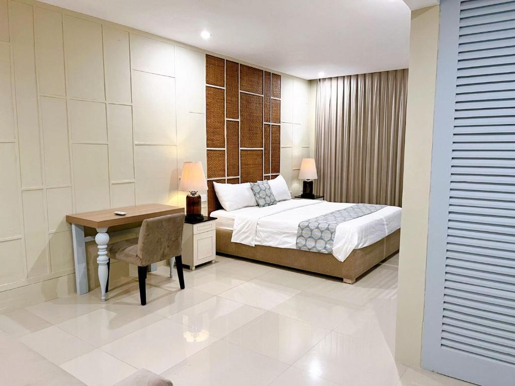 Postel nebo postele na pokoji v ubytování Astana Residence