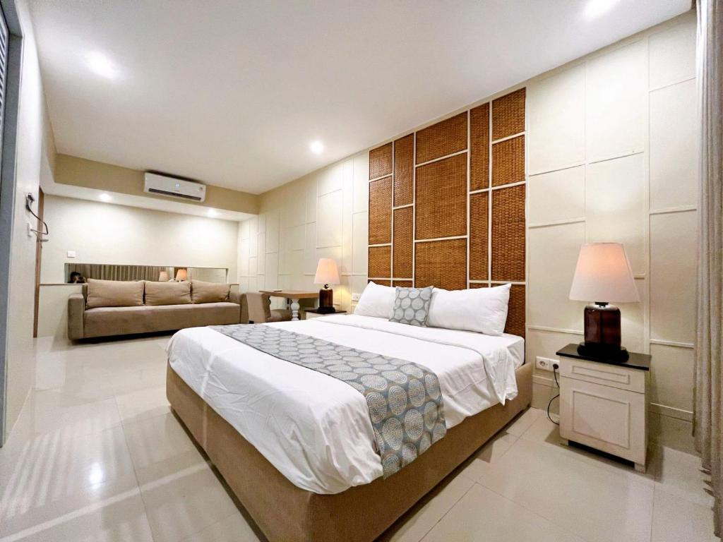 Postel nebo postele na pokoji v ubytování Astana Residence