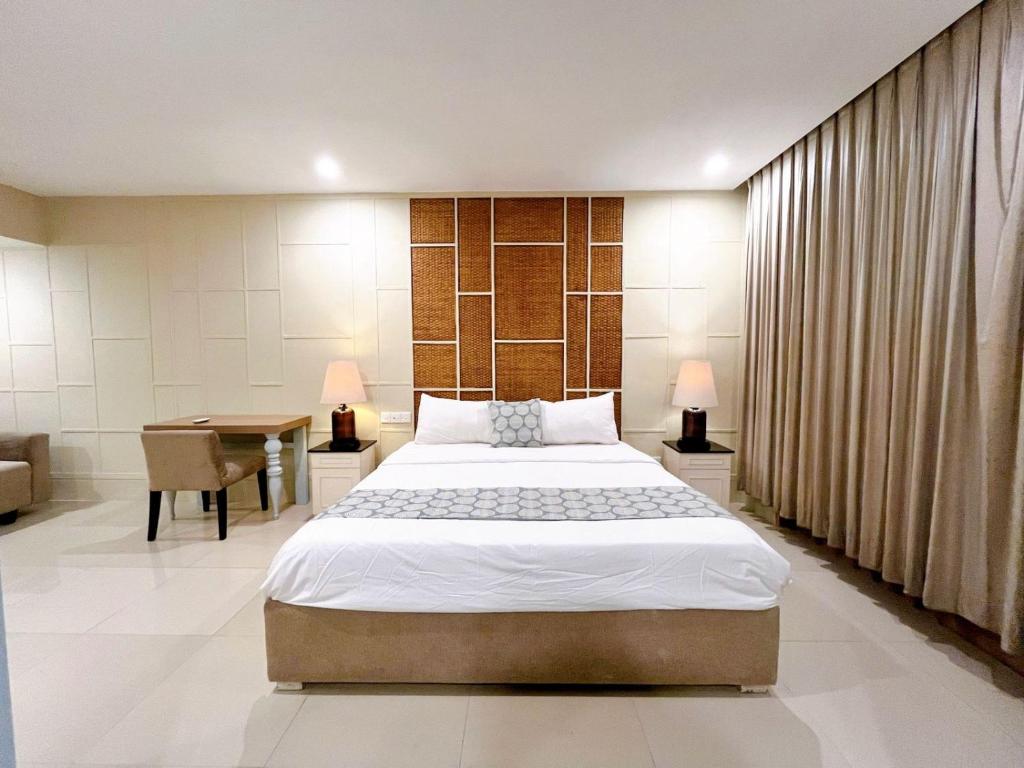 Postel nebo postele na pokoji v ubytování Astana Residence