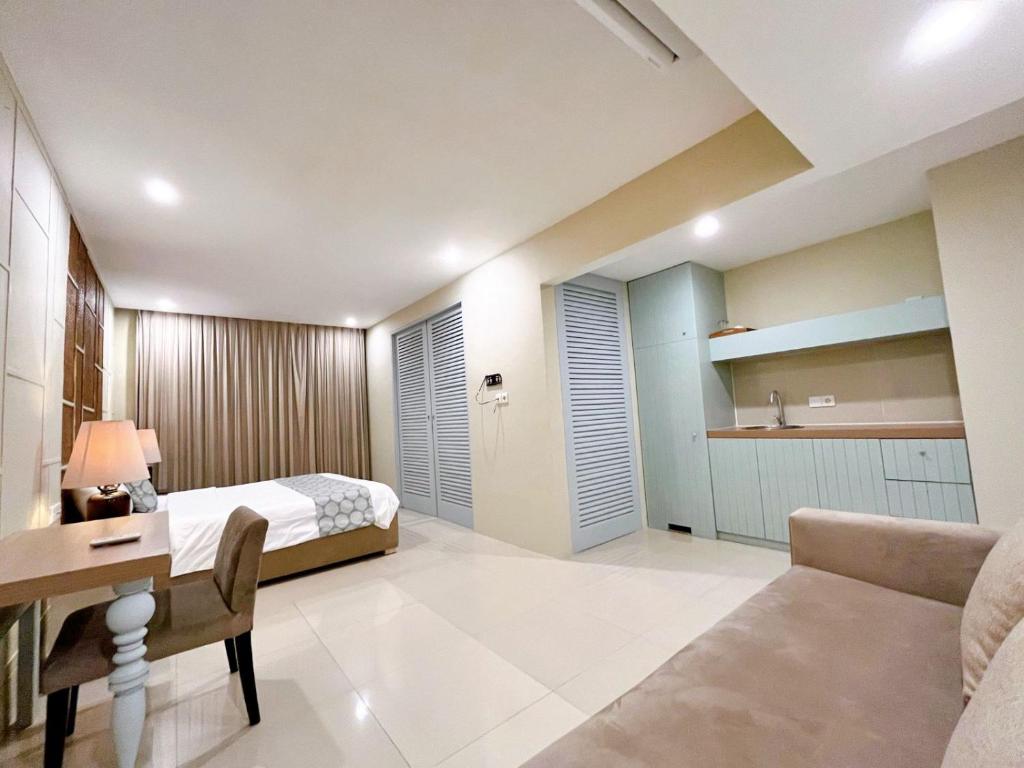 Postel nebo postele na pokoji v ubytování Astana Residence