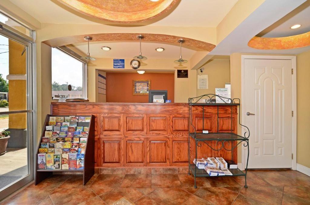 a store with a counter in a room at Americas Best Value Inn Alexandria in Alexandria