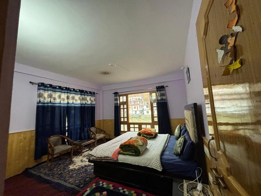 Ένα ή περισσότερα κρεβάτια σε δωμάτιο στο Pullkit Homestay by StayApart