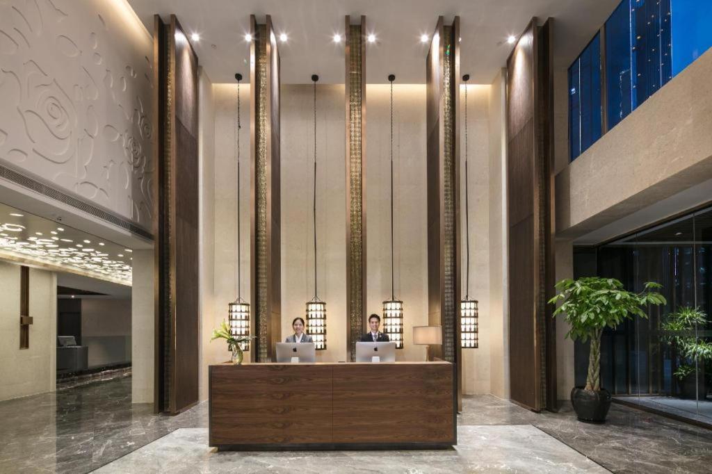 Ο χώρος του λόμπι ή της ρεσεψιόν στο Rosedale Hotel Taicang