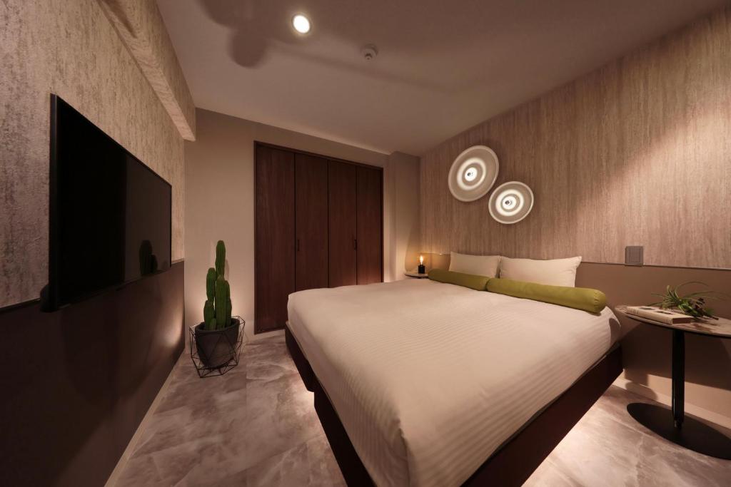 TV a/nebo společenská místnost v ubytování Dotombori Crystal Hotel 3